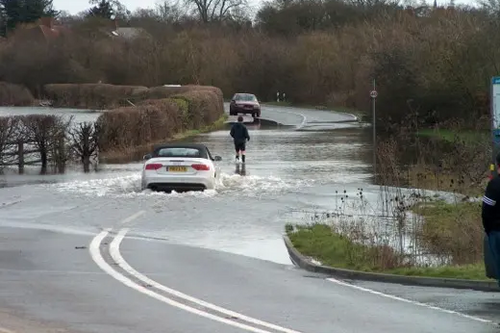 Floooding in Eton Road Datchet in 2014 - The Royal Borough is in the front line of Climate Change