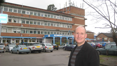Image courtesy of Richard Coe CDT Design & Print use is permitted Liberal Democrats Windsor Constituency only, without prior permission. Julian Tisi infornt of Heatherwood Hospital in Ascot